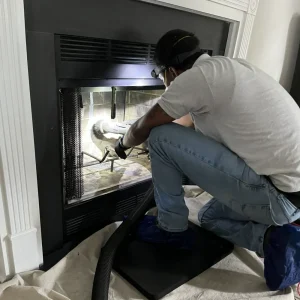 Chimney sweep in Hampton, VA using rotary-powered brushes and HEPA filters