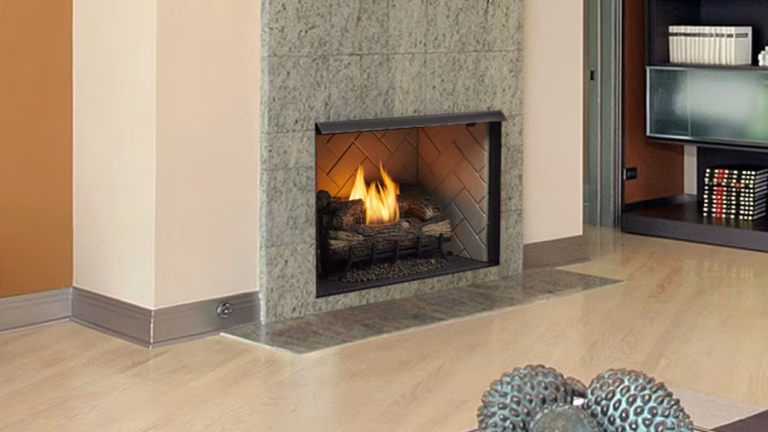 Monessen Exacta vent-free firebox with traditional brick interior and active flame